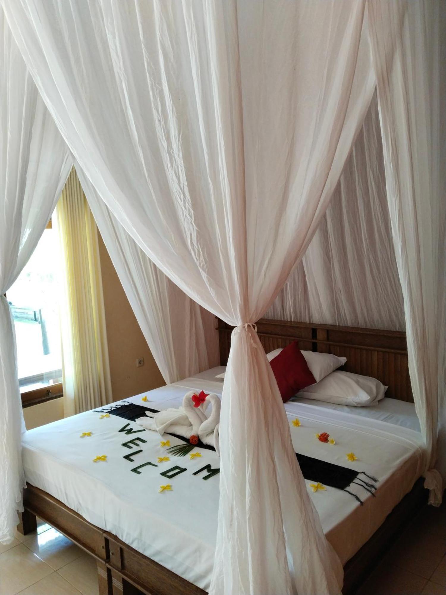 Asih Homestay Pemuteran  Phòng bức ảnh